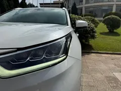 2022 Toyota Highlander Hybrid 2.5L 4WD Premium 7-seat, белый — фото 9