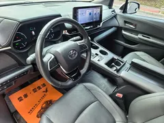 2023 Toyota Sienna 2.5L Hybrid Premium, белый — фото 14
