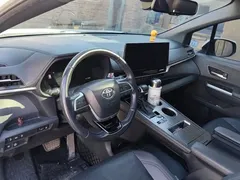 2021 Toyota Sienna 2.5L Hybrid Ultimate, белый — фото 12