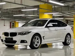 2020 BMW 3 Series GT 320i M Sport Package, белый — фото 1