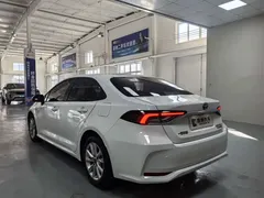 2023 Toyota Corolla 1.8L Hybrid Elite, белый — фото 6
