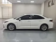 2023 Toyota Corolla 1.8L Hybrid Elite, белый — фото 9