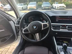 2022 BMW 3 Series 325Li M Sport Dark Package, белый — фото 11