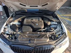 2022 BMW 3 Series 325Li M Sport Dark Package, белый — фото 21