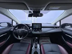 2021 Toyota Corolla TNGA 1.5L CVT GR Sport, белый — фото 16