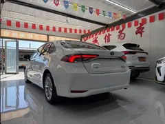 2021 Toyota Corolla Hybrid 1.8L E-CVT Elite, белый — фото 4