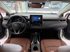 2021 Toyota Corolla Hybrid 1.8L E-CVT Elite, белый — фото 9