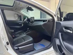 2021 Toyota Corolla 1.2T S-CVT Elite Plus, белый — фото 10