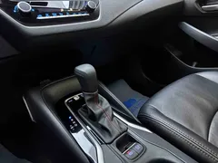 2021 Toyota Corolla 1.2T S-CVT Elite Plus, белый — фото 13