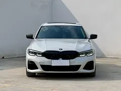 2021 BMW 3 Series 325Li M Sport Night Package, белый — фото 2