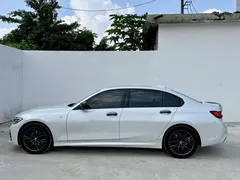 2021 BMW 3 Series 325Li M Sport Night Package, белый — фото 3
