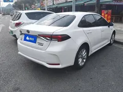 2021 Toyota Corolla Hybrid 1.8L E-CVT Elite, белый — фото 3