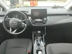 2021 Toyota Corolla Hybrid 1.8L E-CVT Elite, белый — фото 12