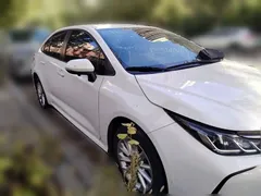 2021 Toyota Corolla 1.2T S-CVT Elite, белый — фото 3