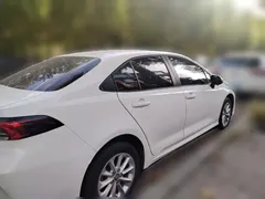 2021 Toyota Corolla 1.2T S-CVT Elite, белый — фото 6