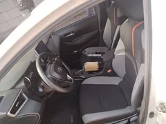 2021 Toyota Corolla 1.2T S-CVT Elite, белый — фото 16