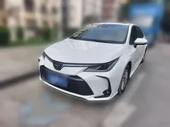 2021 Toyota Corolla TNGA 1.5L CVT Elite, белый — фото 1