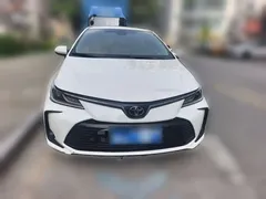2021 Toyota Corolla TNGA 1.5L CVT Elite, белый — фото 2