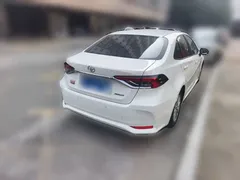 2021 Toyota Corolla TNGA 1.5L CVT Elite, белый — фото 4