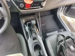 2021 Toyota Corolla TNGA 1.5L CVT Elite, белый — фото 10