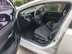 2021 Toyota Corolla TNGA 1.5L CVT Elite, белый — фото 12