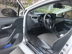 2021 Toyota Corolla 1.2T S-CVT Elite Plus, белый — фото 17