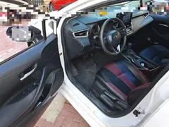 2021 Toyota Corolla 1.2T S-CVT Elite Plus, белый — фото 12
