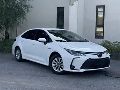 2023 Toyota Corolla 1.8L Hybrid Elite, белый — фото 2