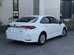 2023 Toyota Corolla 1.8L Hybrid Elite, белый — фото 3
