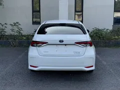 2023 Toyota Corolla 1.8L Hybrid Elite, белый — фото 12