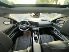 2023 Hyundai Elantra 1.5L CVT LUX Premium, белый — фото 4