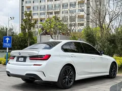 2022 BMW 3 Series 325Li M Sport Night Package, белый — фото 4