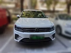 2021 Volkswagen Tiguan L 430PHEV Premium, белый — фото 2