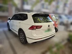 2021 Volkswagen Tiguan L 430PHEV Premium, белый — фото 4