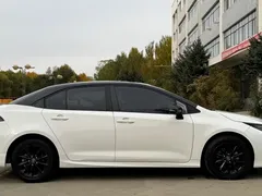 2021 Toyota Corolla TNGA 1.5L CVT GR Sport, белый — фото 4
