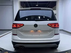 2021 Volkswagen Touran L 280TSI DSG Tuojie Edition 7-seat, белый — фото 5