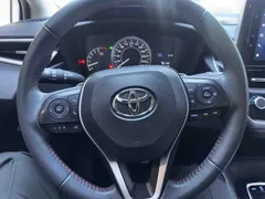 2021 Toyota Corolla TNGA 1.5L CVT GR Sport, белый — фото 13