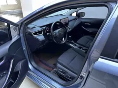 2023 Toyota Corolla 1.8L Hybrid Elite, синий — фото 9