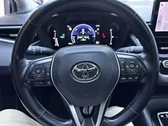2023 Toyota Corolla 1.8L Hybrid Elite, синий — фото 13