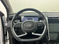2021 Hyundai Tucson L 1.5T DCT LUX Premium, белый — фото 14
