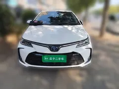 2021 Toyota Corolla Hybrid 1.8L E-CVT Elite, белый — фото 2
