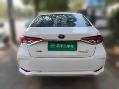 2021 Toyota Corolla Hybrid 1.8L E-CVT Elite, белый — фото 3