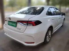 2021 Toyota Corolla Hybrid 1.8L E-CVT Elite, белый — фото 4