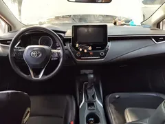 2021 Toyota Corolla Hybrid 1.8L E-CVT Elite, белый — фото 5