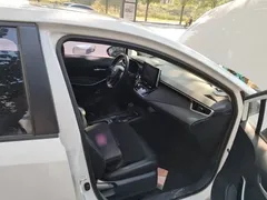 2021 Toyota Corolla Hybrid 1.8L E-CVT Elite, белый — фото 19