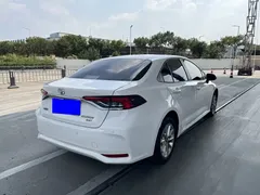2021 Toyota Corolla 1.2T S-CVT Elite Plus, белый — фото 7