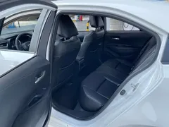 2021 Toyota Corolla 1.2T S-CVT Elite Plus, белый — фото 9