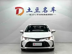 2021 Toyota Corolla Hybrid 1.8L E-CVT Elite, белый — фото 2
