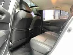 2021 Toyota Corolla Hybrid 1.8L E-CVT Elite, белый — фото 8