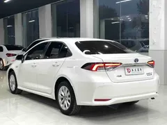 2021 Toyota Corolla Hybrid 1.8L E-CVT Elite, белый — фото 10